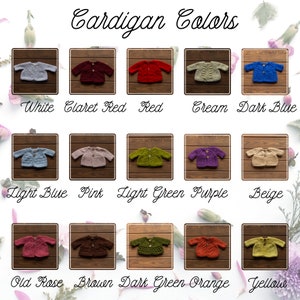 May include: An image showcasing a variety of baby cardigans in different colors, including white, red, and blue. The text "Cardigan Colors" is at the top. Each cardigan is displayed on a wooden background, with color names below.