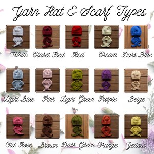 May include: An assortment of yarn hats and scarves in various colors, including white, claret red, red, cream, and dark blue. The image displays the different color options available, with each set neatly arranged on a wooden surface. The text "Yarn Hat & Scarf Types" is at the top.