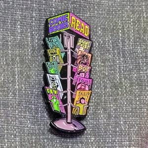 Comic Book Spinner Rack Enamel Pin