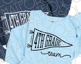 May include: Two sweatshirts are shown, one navy blue and one light blue. The light blue sweatshirt has a black pennant design with the words "4th Grade Team" in a bold, outlined font. The navy blue sweatshirt has a similar design.