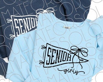 May include: Two sweatshirts, one navy blue and one light blue, with the word "SENIOR" in a black pennant design. The light blue sweatshirt also has the word "girly" in script below the pennant.