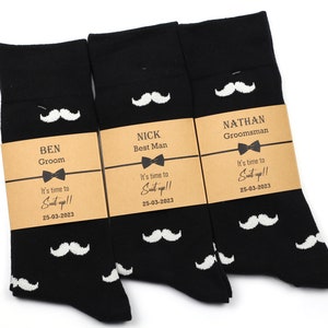 One of the best seller socks, plain black base with white mustaches design. Black and white mustache socks, Classic black socks for groomsmen gift. Groomsmen socks black are great in quality and completes looks, can be worn with any suit or casual.