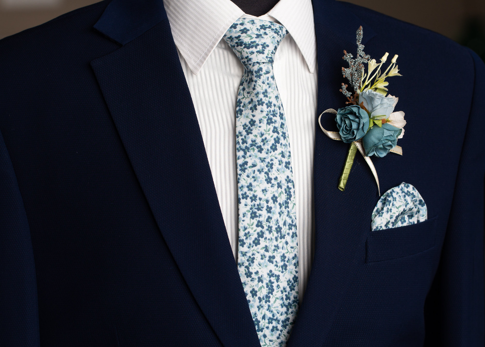 light blue suit floral tie