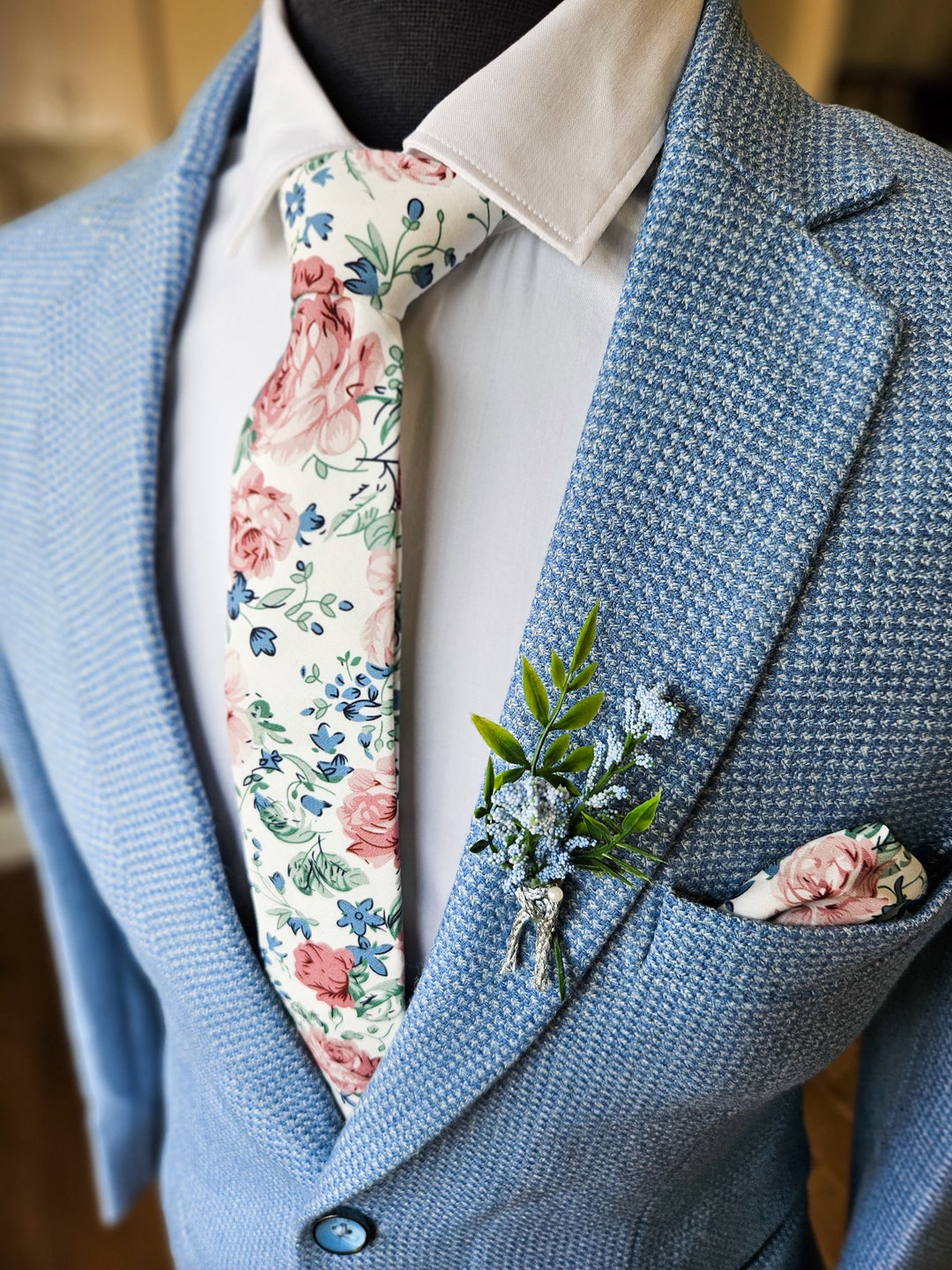 light blue suit floral tie