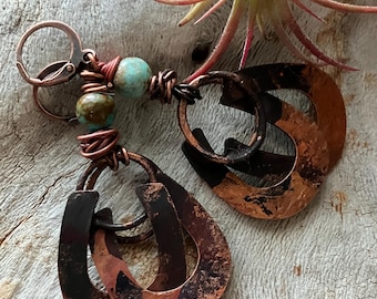 Artisan copper earrings.