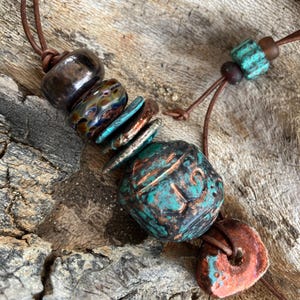 Raku copper ceramic bead necklace.