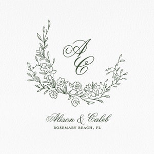 May include: A wedding invitation with a floral wreath design and the couple's names, Alison & Caleb, and the location, Rosemary Beach, FL.
