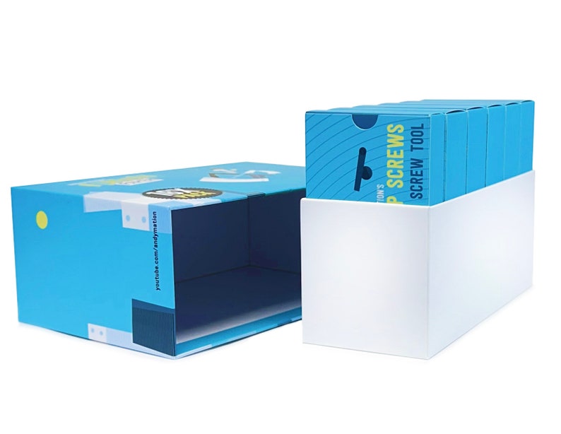 Pode incluir: Um conjunto de seis caixas azuis com texto amarelo que diz "Tom's Tap Screws Screw Tool" e uma imagem amarela de um parafuso. As caixas est&atilde;o em uma caixa branca.