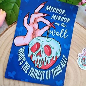 May include: A blue card with the text "Mirror, Mirror on the wall, Who's the fairest of them all?" features a hand with long red nails holding a poisoned apple with a skull design.