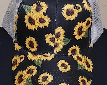 Sunflower hat, has velcro adjustable back as shown in picture.