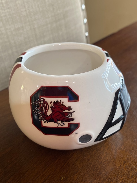 ceramic football helmet Bobble Head — Chesapeake Ceramics Your guests will be talking about this conversation starter long after the final whistle blows. Tulane Green Wave Decorative Ceramic