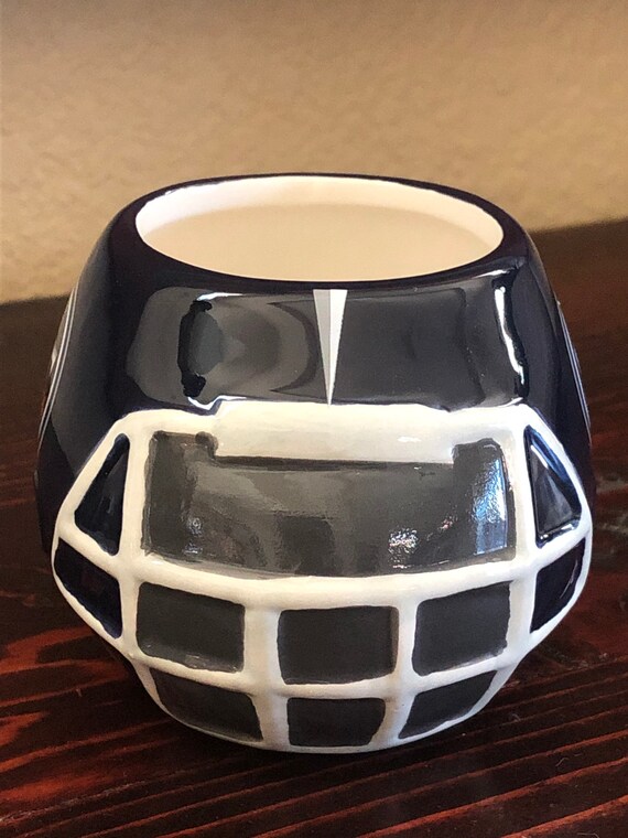 ceramic football helmet Bobble Head Chesapeake Ceramics Your guests will be talking about this conversation starter long after the final whistle blows. Tulane Green Wave Decorative Ceramic