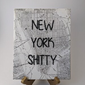 Arte mural bordado, &quot;New York Shi**y&quot;