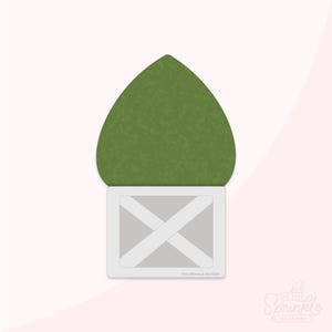 Peut inclure: Un emporte-pièce en forme de feuille verte sur une base rectangulaire blanche avec un motif en forme de X. Le texte "THE SPRINKLE FACTORY" est imprimé sur la base.