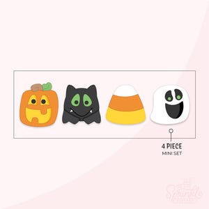 May include: A set of four Halloween-themed cookie cutters. Includes a jack-o'-lantern, a bat, candy corn, and a ghost. The set is labeled "4 PIECE MINI SET". The cookie cutters are in a rectangular frame on a pink background.