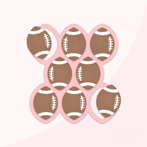 Peut inclure: Un motif découpé représentant huit ballons de football américains bruns avec des coutures blanches, disposés dans un cadre ovale rose interconnecté. Les ballons sont espacés uniformément. Le fond est rose clair.