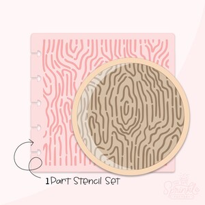 May include: A 1-part stencil set with a pink and brown woodgrain pattern. The stencil is designed for use with a craft cutting machine.