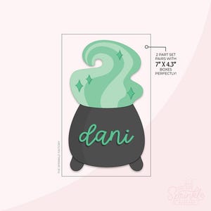 May include: A green cauldron with a green and white smoke design and the name "dani" written on the front. The cauldron is on a white background with text that says "2 part set pairs with 7" x 4.3" boxes perfectly!"
