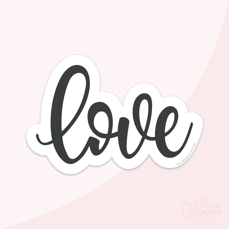 May include: A black and white sticker with the word "love" written in a cursive font. The sticker is on a white background.