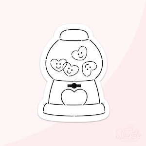 May include: A black and white line drawing of a gumball machine with hearts inside. The gumball machine has a heart-shaped base and a crank on the side.
