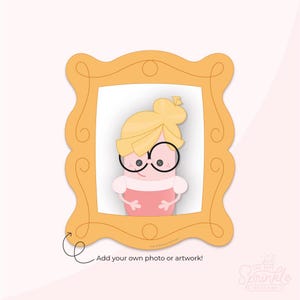 May include: A cartoon illustration of a character with blonde hair, glasses, and a pink dress, set within a gold-colored frame. The frame has a decorative, wavy edge. Text at the bottom reads, "Add your own photo or artwork!"