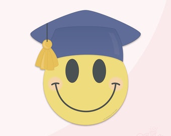 May include: A yellow smiley face wearing a blue graduation cap with a yellow tassel. The smiley face has a big smile and two black eyes. The text "The Sprinkle Factory" is printed on the bottom of the smiley face.