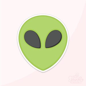 Puede incluir: Una pegatina de cabeza de alienígena verde con grandes ojos ovalados negros y un borde blanco. La cabeza del alienígena es de color verde claro y está centrada en un fondo rosa claro. La pegatina tiene un estilo de dibujos animados.
