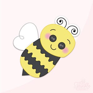 Op de afbeelding: Een cartoon bijensticker met een gele kop, zwarte ronde ogen, roze wangen en twee zwarte voelsprieten. Het lichaam heeft gele en zwarte golvende strepen, een enkele witte vleugel en de tekst The Sprinkle Factory in een klein lettertype.