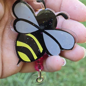 Changeable Trendy Bee Badge Reel for Teachers, Students, and Medical Personnel - Easy to Clean and Show Personality