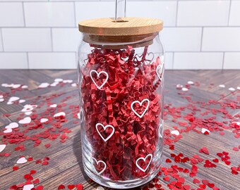 Lata de vidrio de corazones blancos