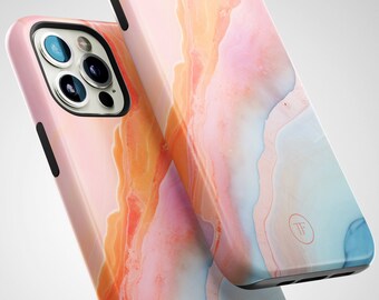 May include: Two pink, orange, and blue marble phone cases with a white logo that says "TF".