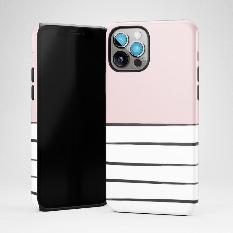 May include: A pink and white striped phone case with black stripes. The case has a cutout for the camera lens.