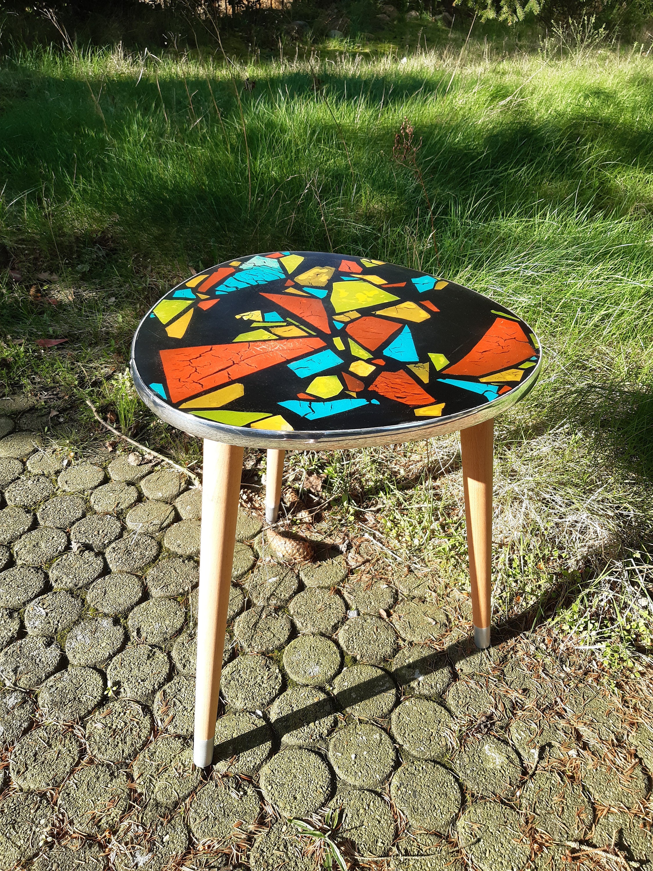 Coffee table as a larger replica of the classic flower stool