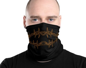 May include: Black neck gaiter with an orange barbed wire design. The design features two rows of barbed wire with a stylized mouth shape in the center.