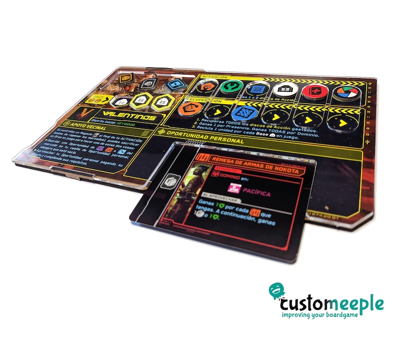 May include: A close-up of a board game component with a black and yellow design. The component features the text "Valentinos" and "Apoyo Vecinal". The component also features a red and black card with the text "Remesa de Armas de Nokota" and "Pac&iacute;fica".