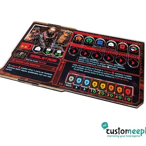 May include: A red and black board game player card with the title "Maelstrom" and the subtitle "Hasta los dientes". The card features a character with a skull mask and a weapon. The card has icons for activation, recovery, and fury.