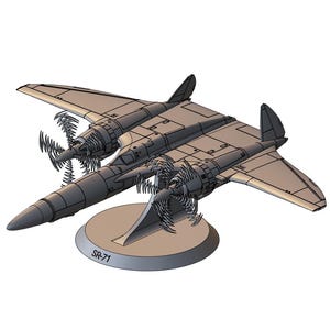 Puede incluir: Maqueta gris de avión con dos hélices y un soporte. El modelo tiene una nariz larga y puntiaguda y dos alas. El soporte es redondo y tiene el texto "SR-71".