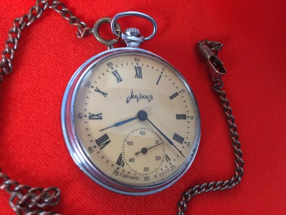 Vintage pocket mechanical watch Molnija with chain - image 3