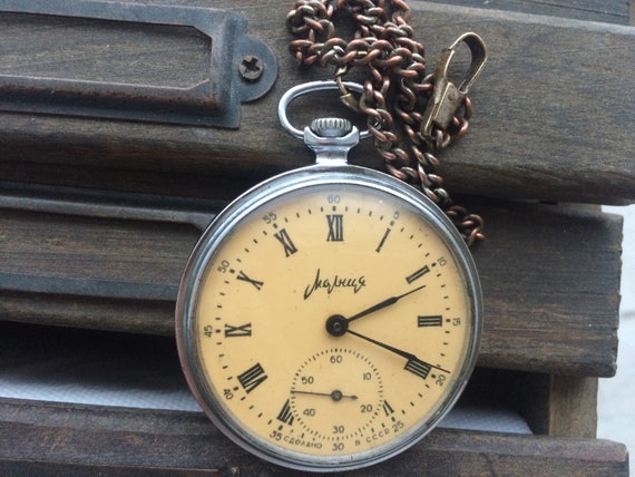Vintage pocket mechanical watch Molnija with chain - image 1