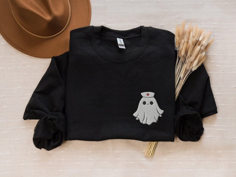 Embroidered nurse doctor ghost halloween sweatshirt in the colour black