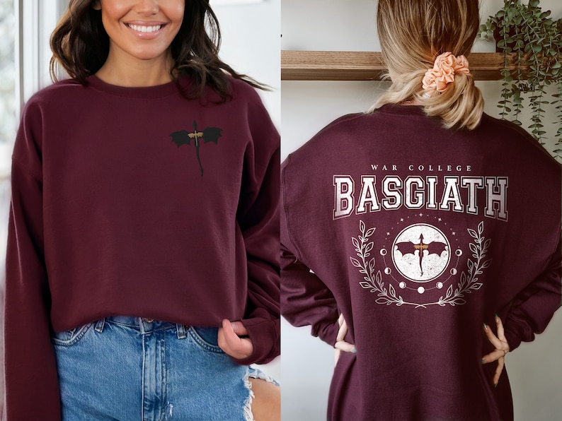 Four wing embroidered front with basgiath war college vintage print on the back of maroon sweatshirt