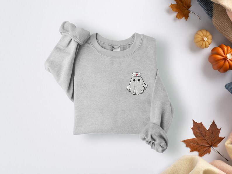Embroidered nurse doctor ghost halloween sweatshirt in the colour sport grey