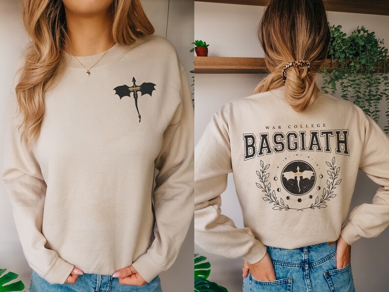 Four wing embroidered front with basgiath war college vintage print on the back of sand sweatshirt
