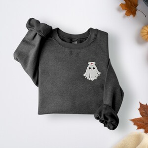 Embroidered nurse doctor ghost halloween sweatshirt in the colour dark heather