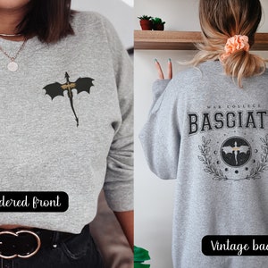Four wing embroidered front with basgiath war college vintage print on the back of sport grey sweatshirt