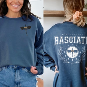 Four wing embroidered front with basgiath war college vintage print on the back of indigo blue sweatshirt