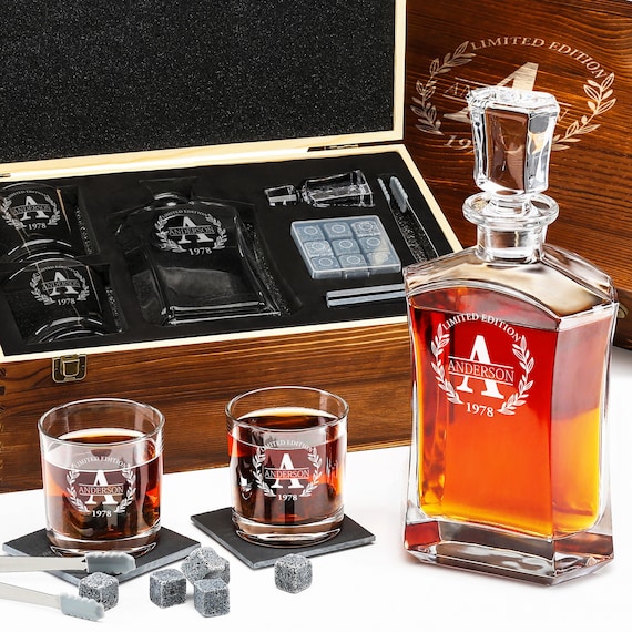 A complete engraved whiskey set — decanter, glasses, granite chilling stones, and a wooden box — that arrives as a ready-to-gift package with 91 favorites backing its appeal.