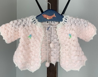 Vintage Baby - Hand-Crocheted Tie-Neck Cardigan in Pink with Blue Floral Detail