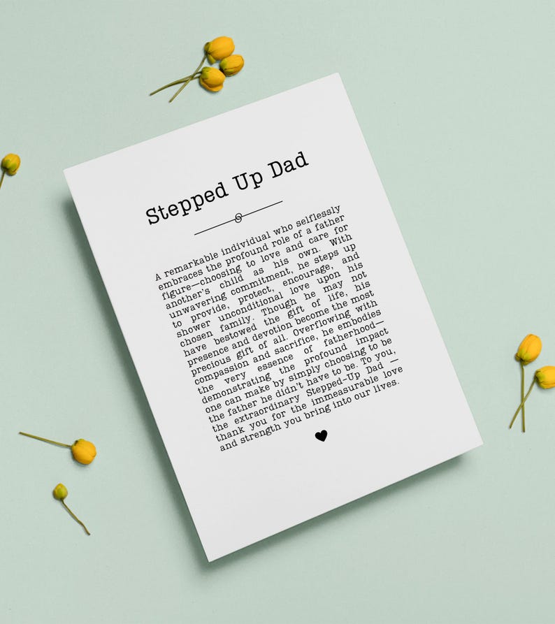 May include: A white card with the text "Stepped Up Dad" and a heartfelt message about fatherhood. The card is decorated with small yellow flowers and a heart symbol, perfect for a gift.