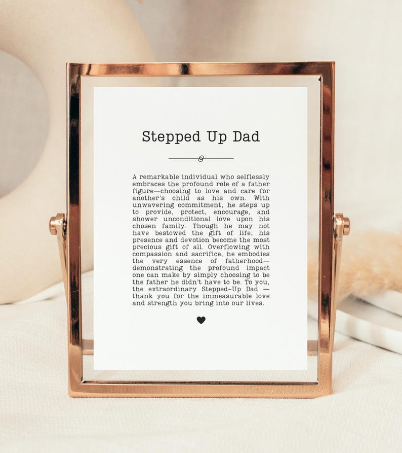 May include: A framed print with the text "Stepped Up Dad" in a rose gold frame. The print features a heartfelt message about fatherhood, expressing gratitude for the love and strength provided by a father figure.